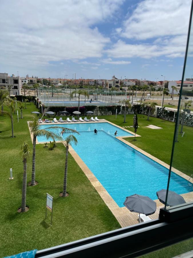 Bel appartement pied sur mer vue imprenable sur piscine et jardins Sidi Rahal  Extérieur photo