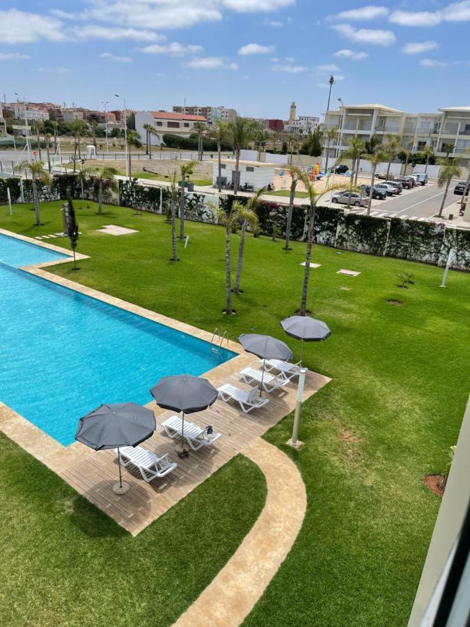 Bel appartement pied sur mer vue imprenable sur piscine et jardins Sidi Rahal  Extérieur photo