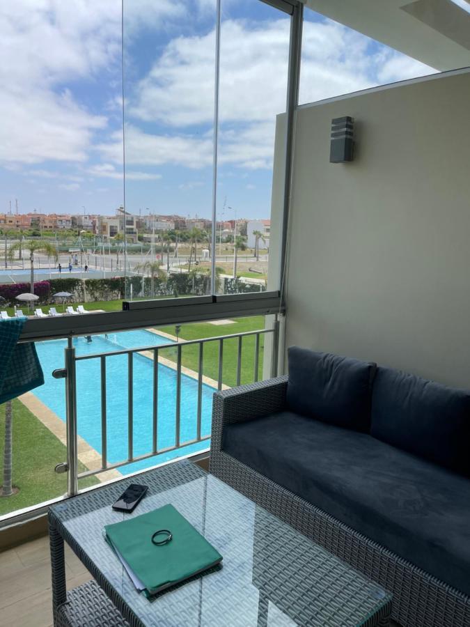 Bel appartement pied sur mer vue imprenable sur piscine et jardins Sidi Rahal  Extérieur photo