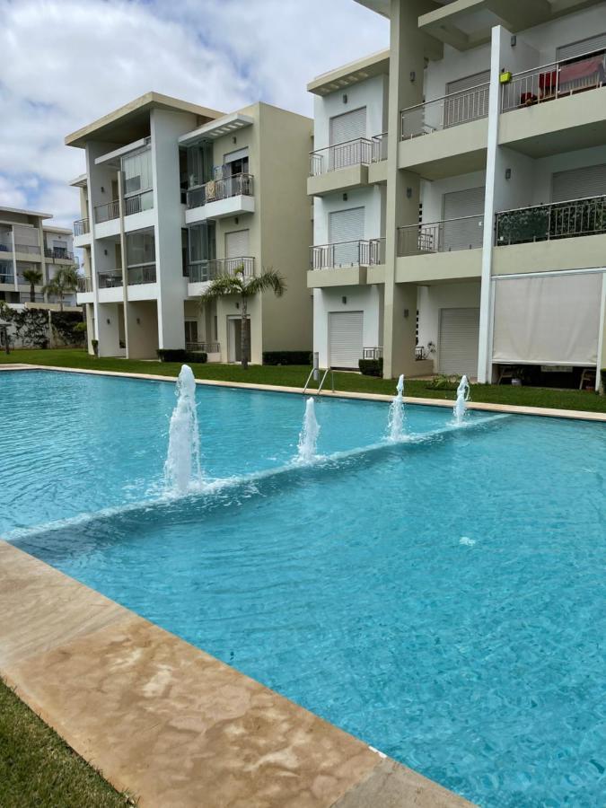 Bel appartement pied sur mer vue imprenable sur piscine et jardins Sidi Rahal  Extérieur photo