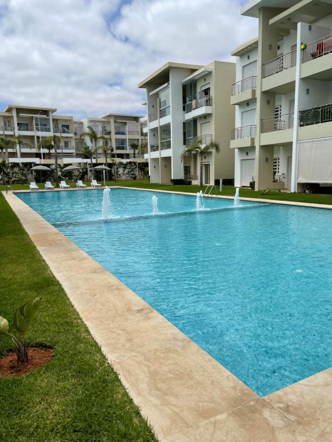 Bel appartement pied sur mer vue imprenable sur piscine et jardins Sidi Rahal  Extérieur photo