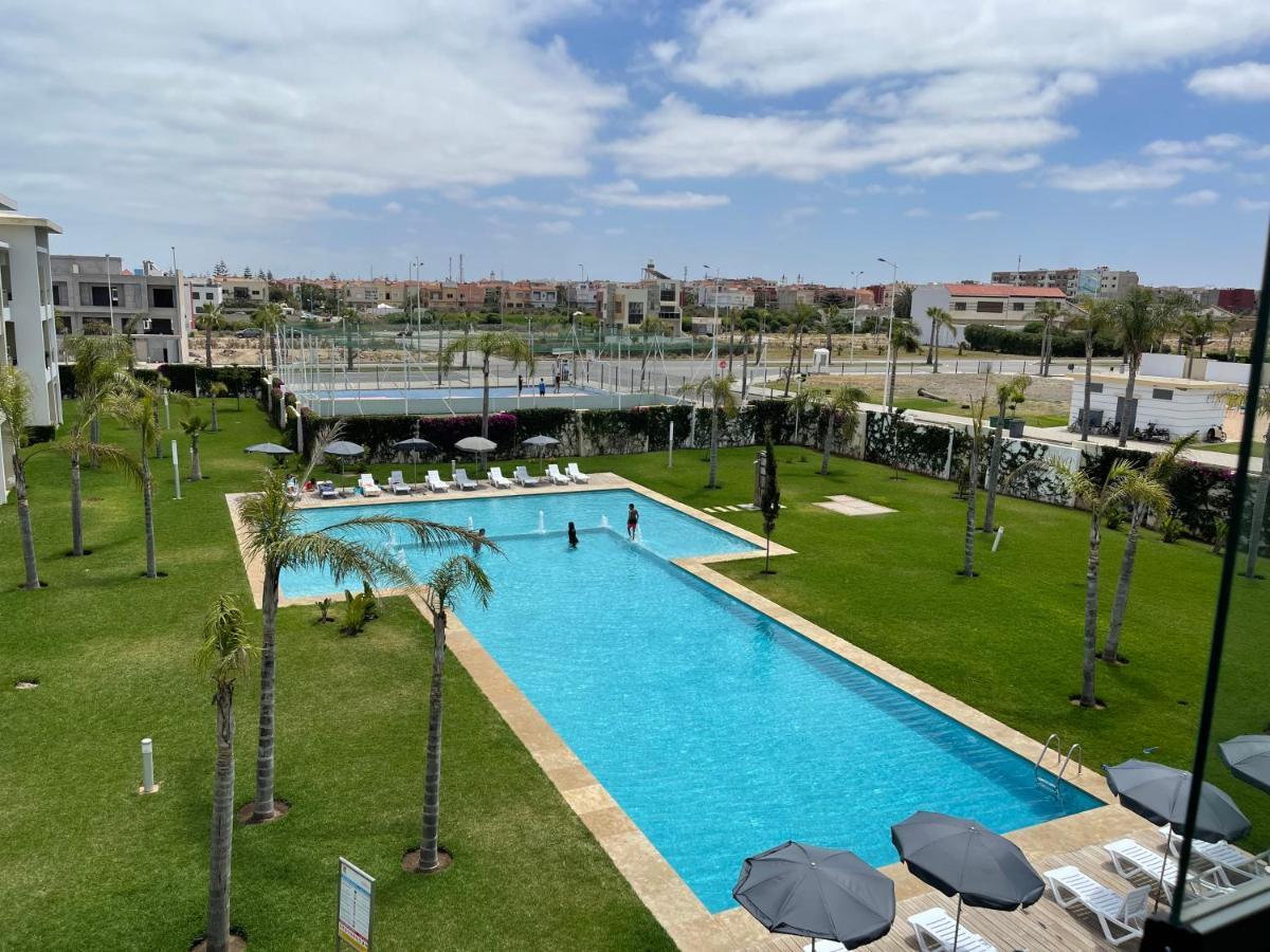 Bel appartement pied sur mer vue imprenable sur piscine et jardins Sidi Rahal  Extérieur photo