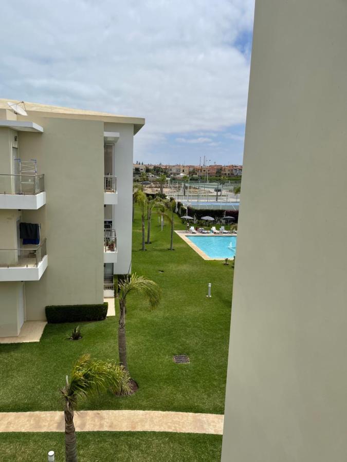 Bel appartement pied sur mer vue imprenable sur piscine et jardins Sidi Rahal  Extérieur photo