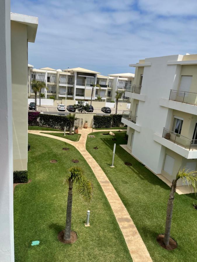 Bel appartement pied sur mer vue imprenable sur piscine et jardins Sidi Rahal  Extérieur photo