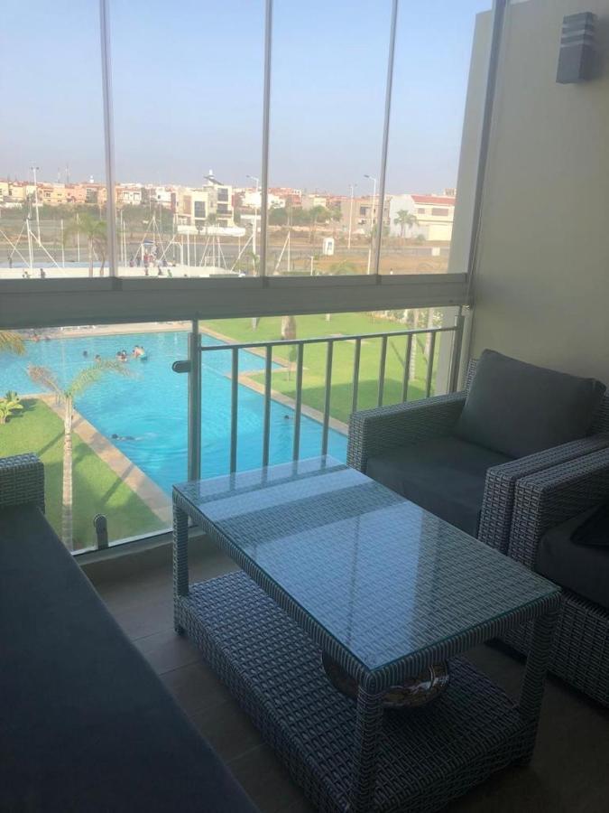 Bel appartement pied sur mer vue imprenable sur piscine et jardins Sidi Rahal  Extérieur photo