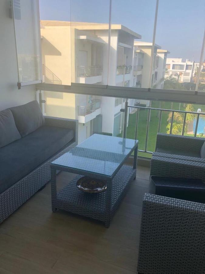 Bel appartement pied sur mer vue imprenable sur piscine et jardins Sidi Rahal  Extérieur photo